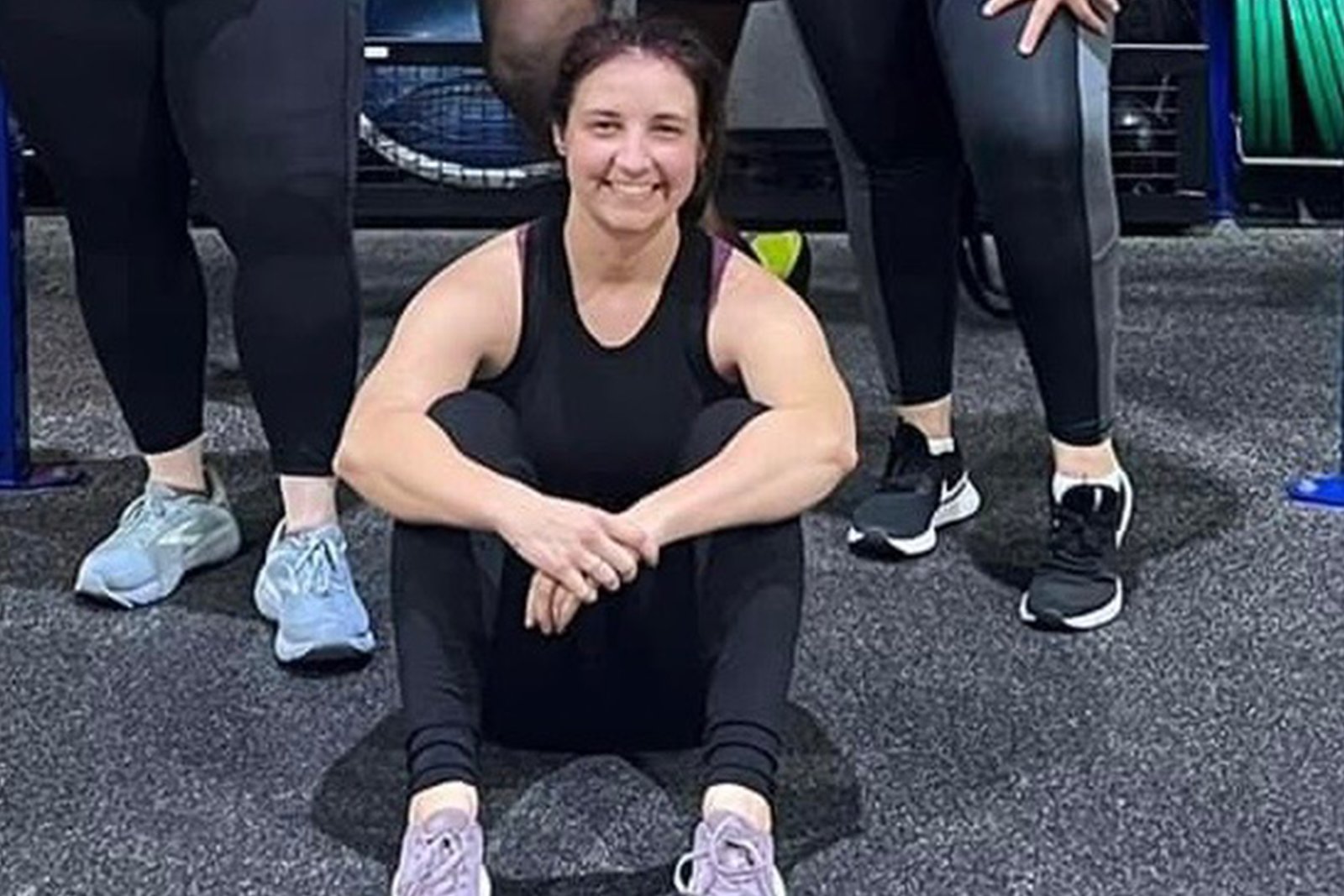 Coach Sydney after a group fitness class